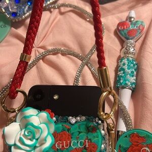 Teal and Red Floral Phone Strap with Charm and Matching Pen.